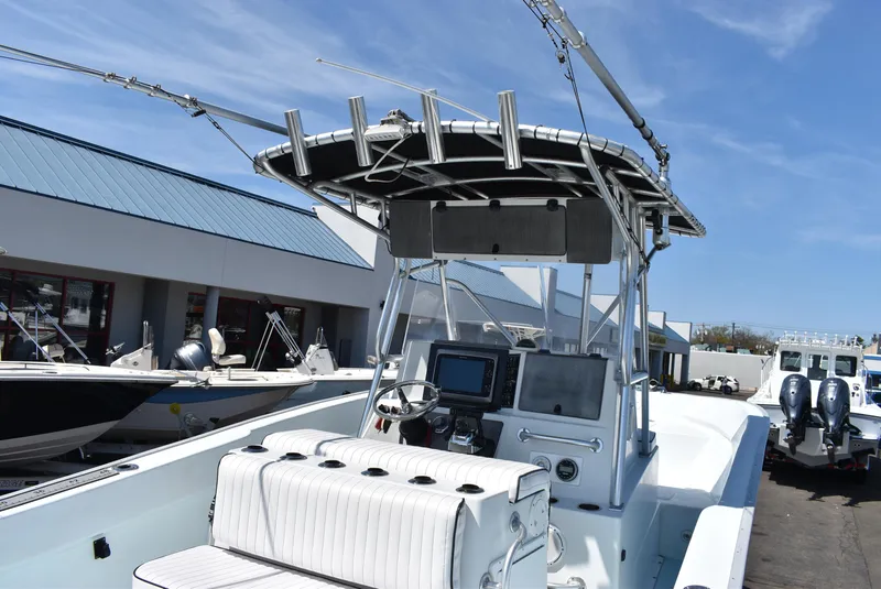 Slide: The Image of 2006 Cape Horn 27 CC boat with center console and fishing rod holders. - 9