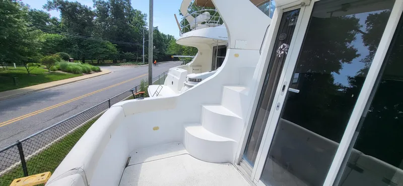 Slide: The Image of Carver 350 Mariner 2000 yacht with outdoor stairs and sliding glass door. - 24