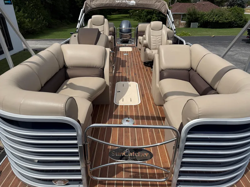 Slide: The Image of Luxurious 2018 SunCatcher Elite 322 RC pontoon boat with plush seating and sleek design. - 9