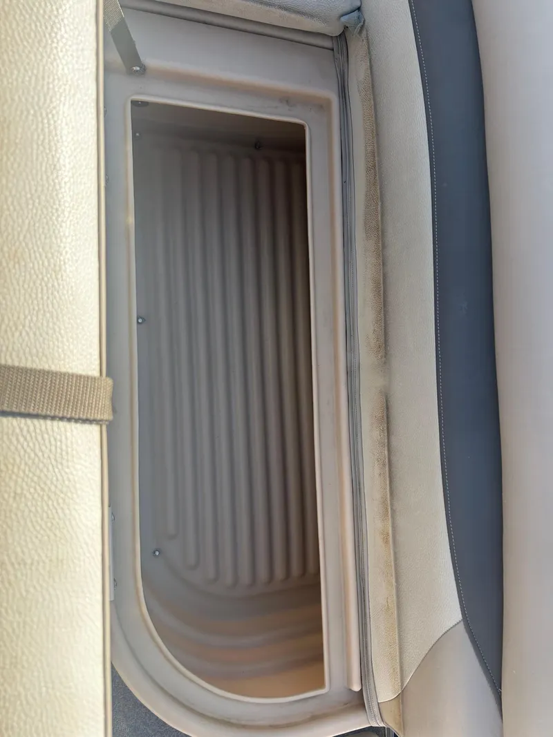 Slide: The Image of Storage compartment in 2016 Sun Tracker Party Barge 18 DLX pontoon boat. - 22