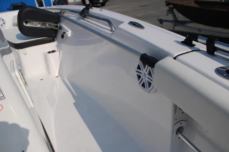 Slide: The Image of 2021 Tidewater 198 CC Adventure boat interior with seating and speaker detail. - 13