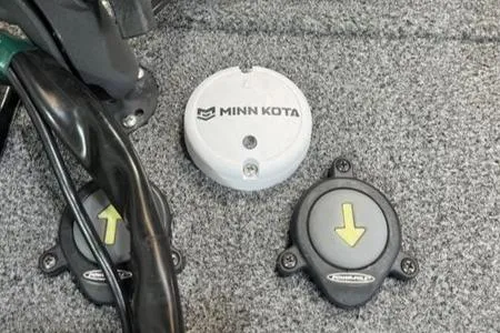 Slide: The Image of 2020 Tracker Pro Team 195 TXW boat with Minn Kota components on carpeted deck. - 11