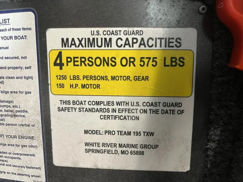 Slide: The Image of U.S. Coast Guard capacity label for 2020 Tracker Pro Team 195 TXW boat. - 14