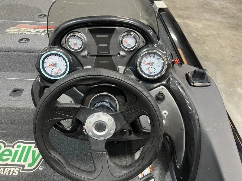 Slide: The Image of Dashboard of a 2020 Tracker Pro Team 195 TXW boat with steering wheel and gauges. - 8