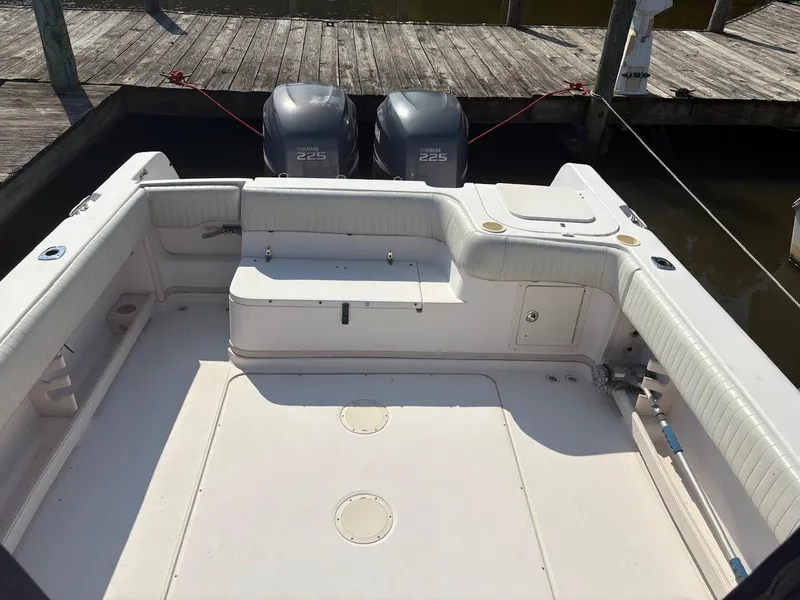 Slide: The Image of 2003 Grady-White Sailfish 282 boat with twin Yamaha 225 engines at dock. - 15