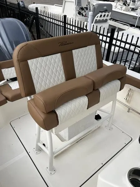 Slide: The Image of 2026 Pioneer 222 Islander boat seat with brown and white quilted upholstery. - 13