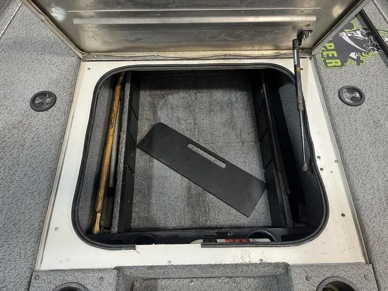 Slide: The Image of Open storage compartment in 2019 Tracker Pro Team 175 TXW boat. - 13