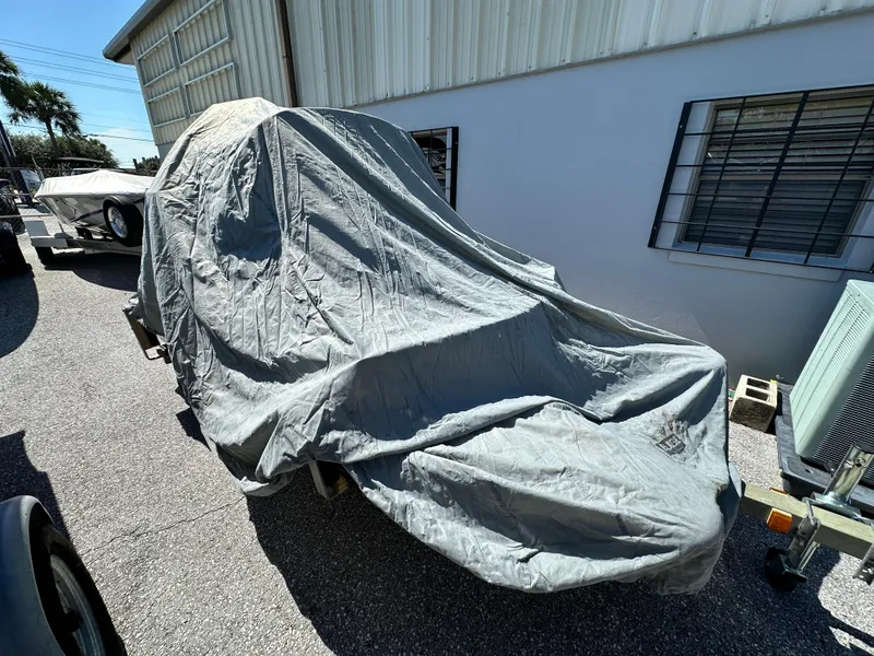 Slide: The Image of Covered 2020 CraigCat E2 Elite parked outside a building. - 10