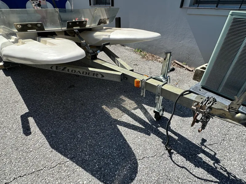 Slide: The Image of Trailer for 2020 CraigCat E2 Elite on asphalt, featuring EZ Loader branding. - 9