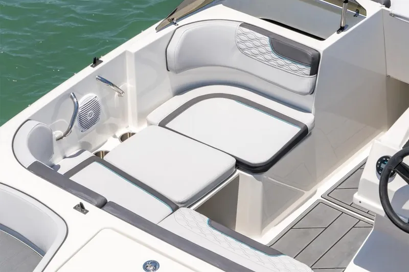 Slide: The Image of 2025 Bayliner Element M17 boat interior with steering wheel and seating. - 7