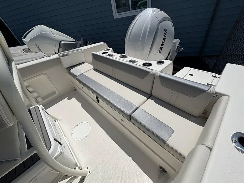 Slide: The Image of 2026 Sailfish 232 CC boat interior with Yamaha engine, featuring comfortable seating and modern design. - 13