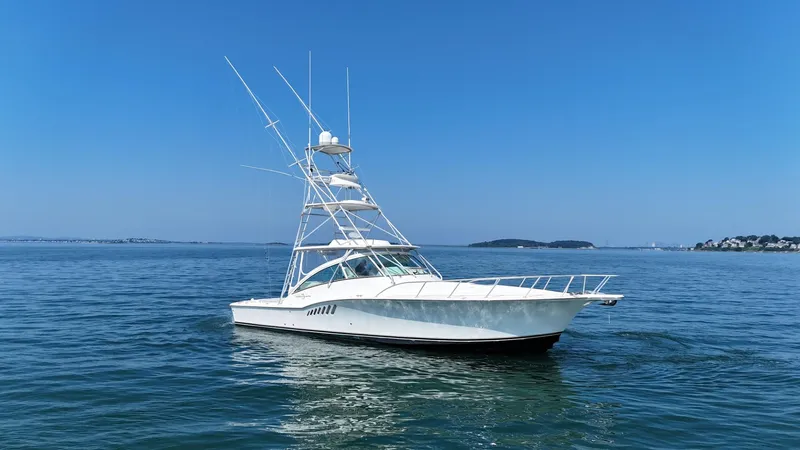 The Image of 2007 Albemarle 410 Express Fisherman yacht on calm blue ocean waters. - 0