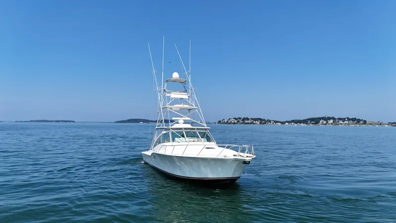 Slide: The Image of 2007 Albemarle 410 Express Fisherman boat on calm sea with clear blue sky. - 10