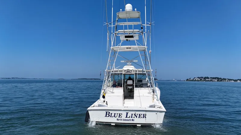 Slide: The Image of 2007 Albemarle 410 Express Fisherman boat on calm sea, clear blue sky. - 6
