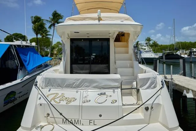 Slide: The Image of 2015 Carver C34 Command Bridge yacht docked in Miami, Florida marina. - 20