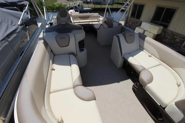 Slide: The Image of 2025 Avalon LSZ Versatile Rear Bench pontoon boat with spacious seating and modern design. - 4