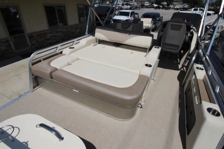 Slide: The Image of 2025 Avalon LSZ Versatile Rear Bench boat with spacious seating and modern design. - 6