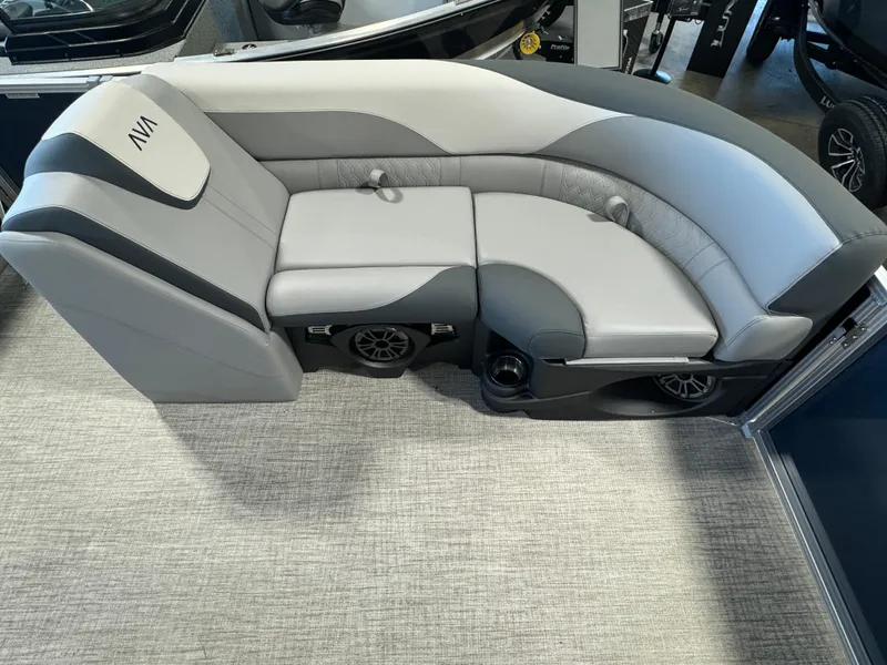 Slide: The Image of Luxurious 2025 Avalon LSZ VRB boat seating with gray upholstery and integrated speakers. - 8