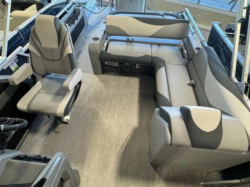 Slide: The Image of Interior of 2025 Avalon LSZ VRB pontoon boat with gray seating and modern design. - 9