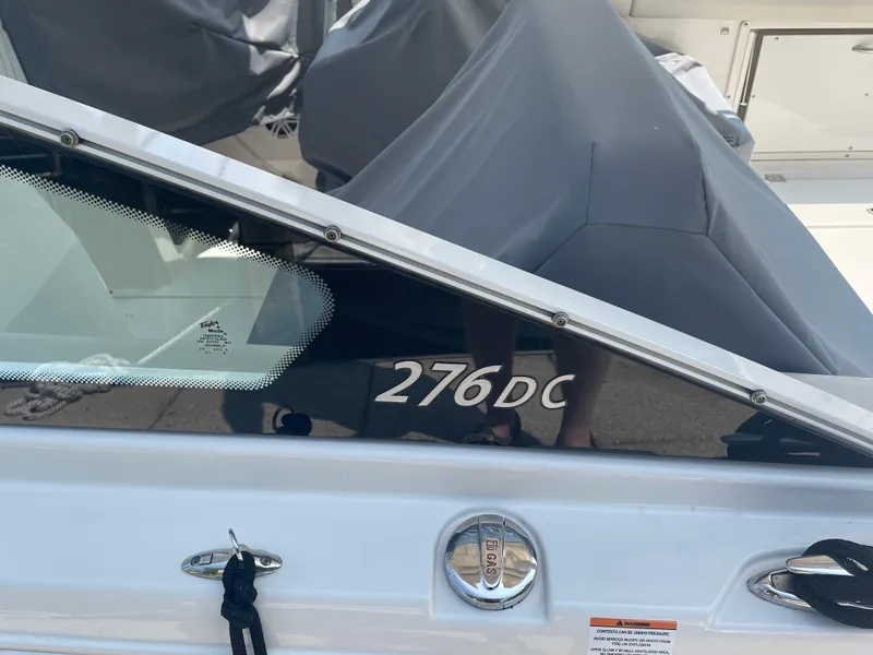 Slide: The Image of Sailfish 276 DC boat, 2023 model, with cover. - 10