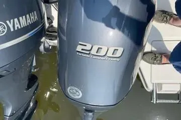 Slide: The Image of Yamaha 200 HP outboard motor on Sailfish 276 DC boat, year 2023. - 9