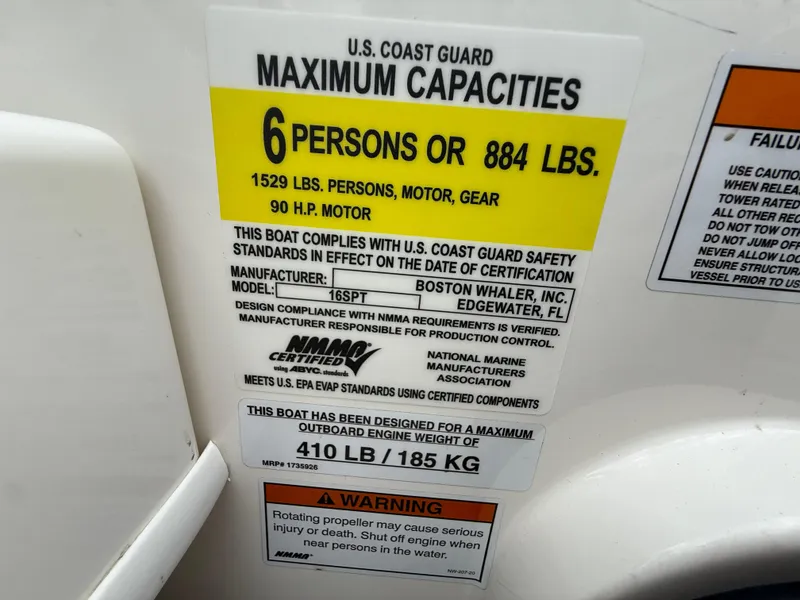 Slide: The Image of Capacity label on 2022 Boston Whaler 160 Super Sport, indicating 6-person or 884 lbs limit. - 16