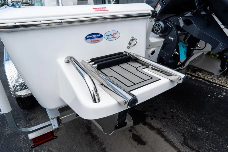 Slide: The Image of 2026 Tidewater 2110 Bay Max boat with swim platform and ladder. - 23