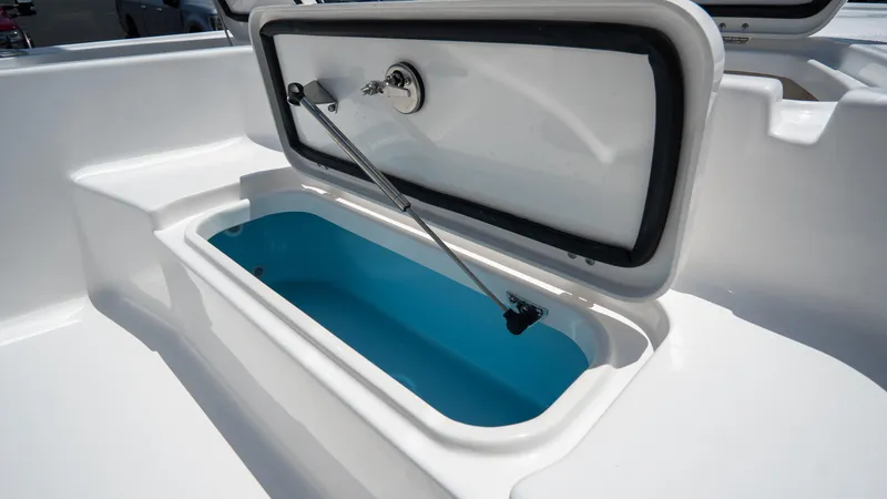 Slide: The Image of Open storage compartment on 2025 Tidewater 2110 Bay Max boat. - 9