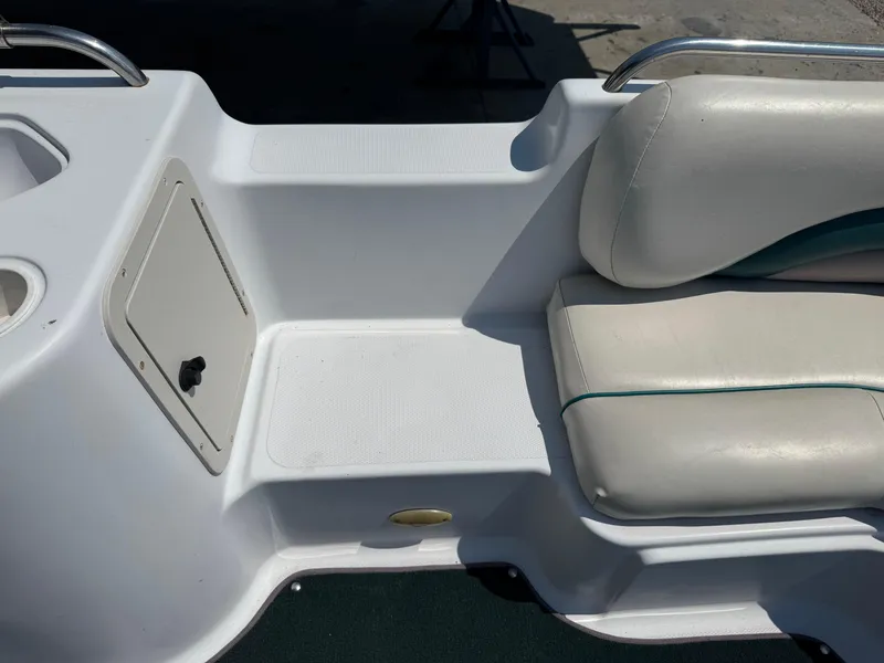 Slide: The Image of 2001 Hurricane FunDeck GS 201 OB boat interior seating and storage compartment. - 15