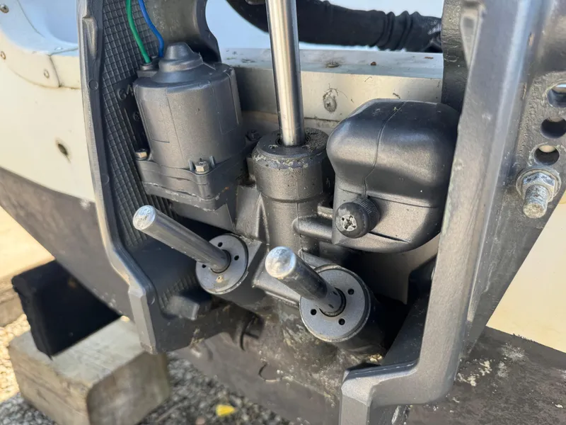 Slide: The Image of Close-up of a 2001 Hurricane FunDeck GS 201 OB boat engine components. - 8