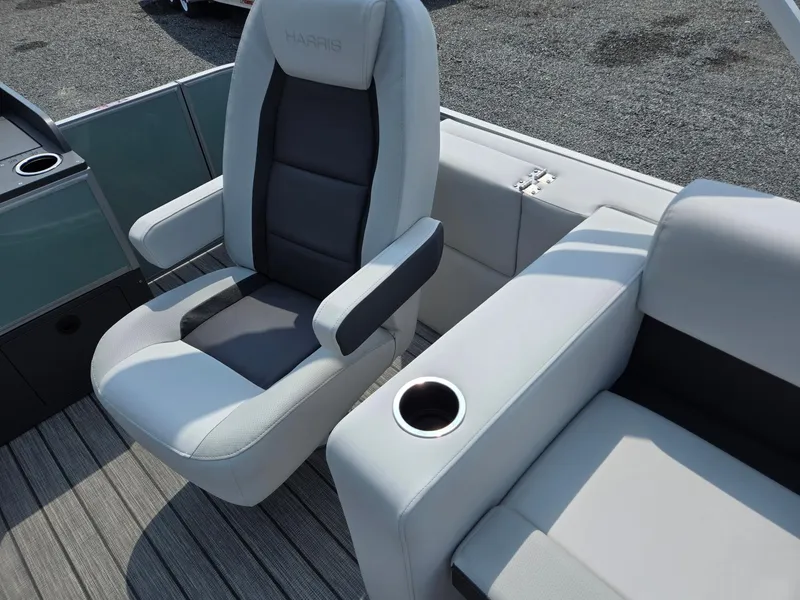 Slide: The Image of Luxurious seating on 2026 Harris Cruiser 210 boat with cup holder and sleek design. - 23