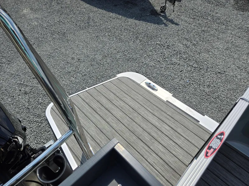 Slide: The Image of 2026 Harris Cruiser 210 boat deck with sleek design and durable flooring. - 29