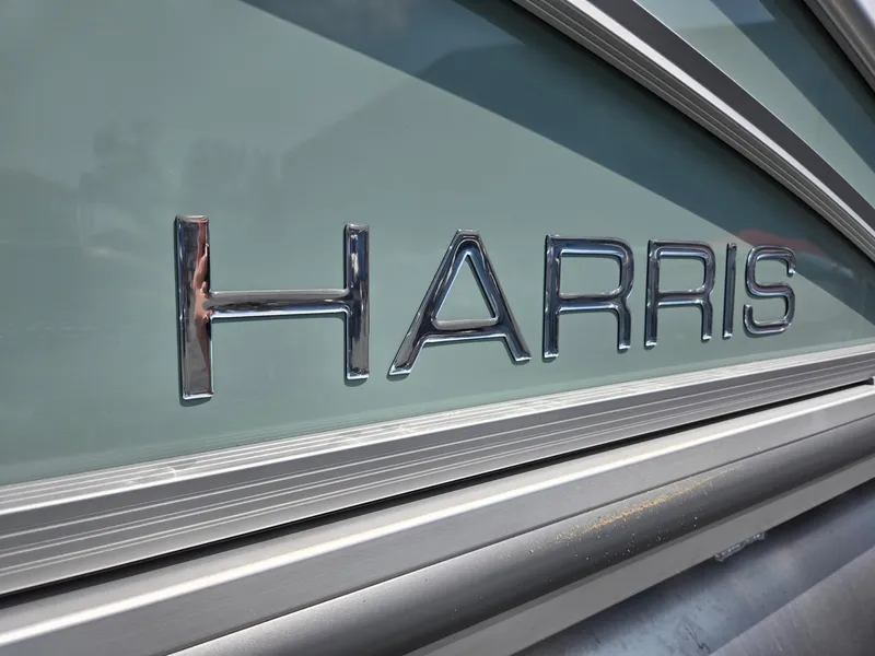 Slide: The Image of Close-up of 2026 Harris Cruiser 210 logo on boat exterior. - 42