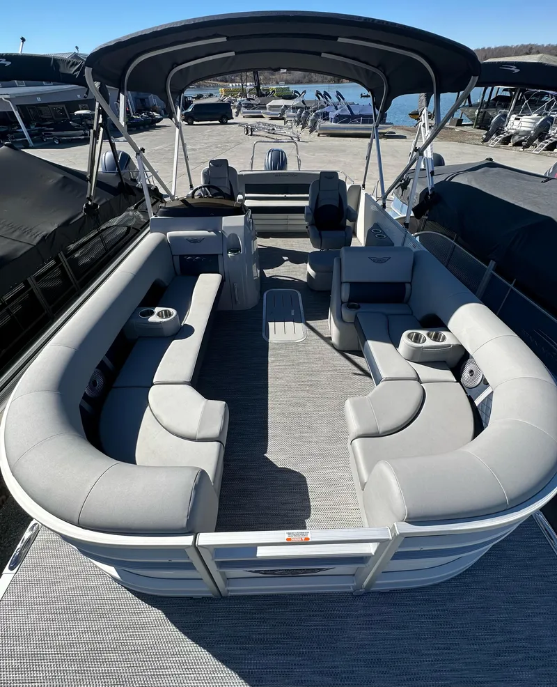 Slide: The Image of 2024 Bennington L 23 Swingback pontoon boat with spacious seating and canopy. - 3