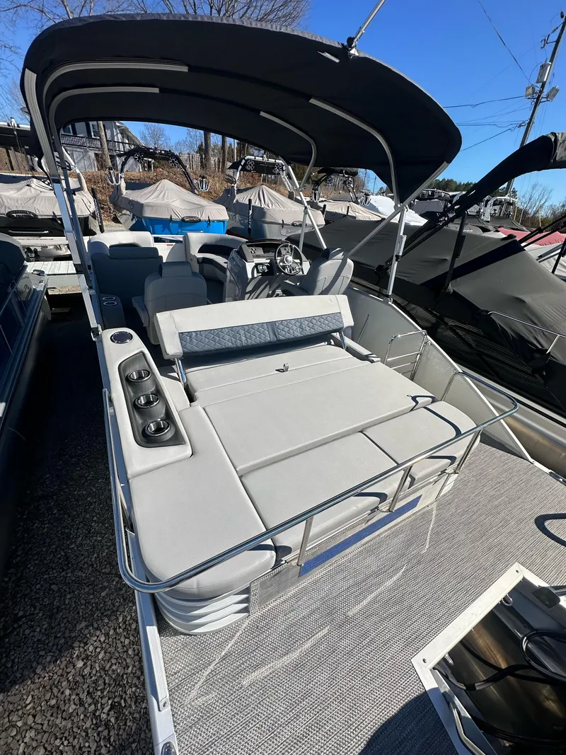 Slide: The Image of 2024 Bennington L 23 Swingback pontoon boat with canopy and spacious seating. - 6