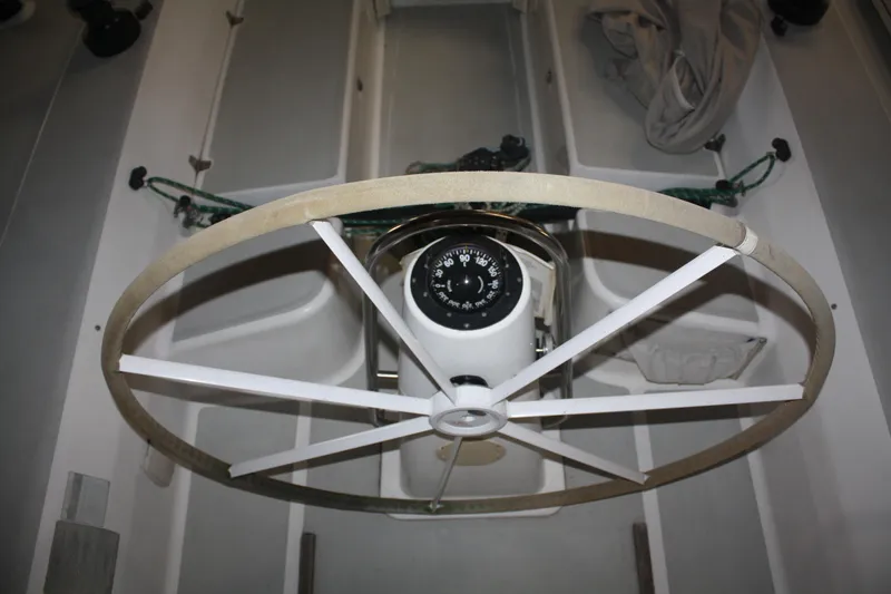 Slide: The Image of Steering wheel and compass of 2002 J Boats J/105 sailboat cockpit. - 18