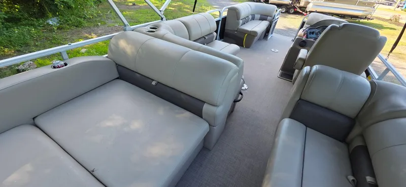 Slide: The Image of 2021 Sun Tracker 22 Party Barge RF interior with spacious seating and modern design. - 12