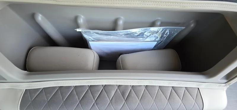 Slide: The Image of Storage compartment in a 2021 Sun Tracker 22 Party Barge RF boat. - 18