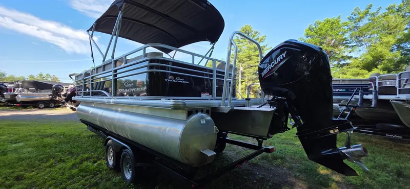 Slide: The Image of 2021 Sun Tracker 22 Party Barge RF pontoon boat with Mercury outboard motor on trailer. - 19
