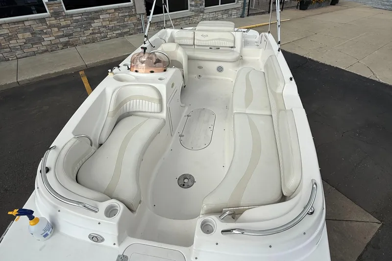 Slide: The Image of 2007 Smoker Craft Vectra 2040 boat interior with white seating and spacious layout. - 5