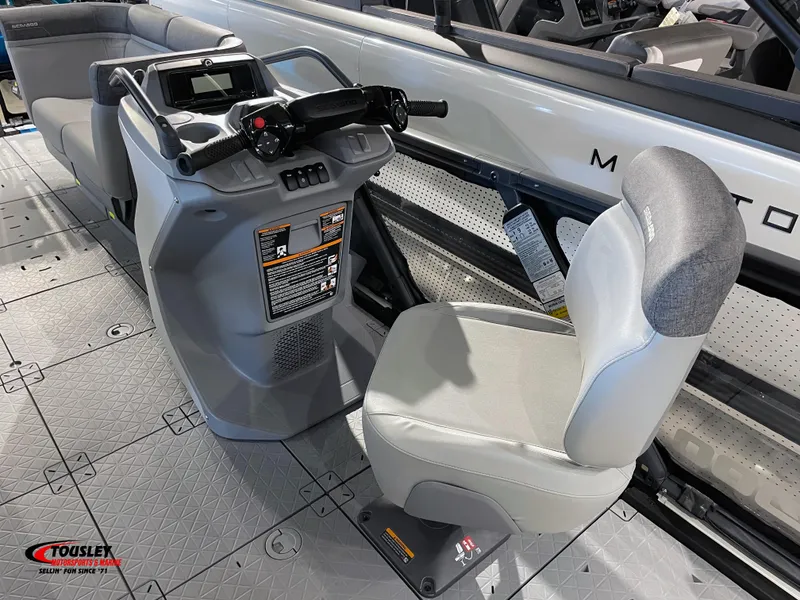 Slide: The Image of 2023 Sea-Doo Switch 19 interior with steering console and seating, showcasing modern design. - 4