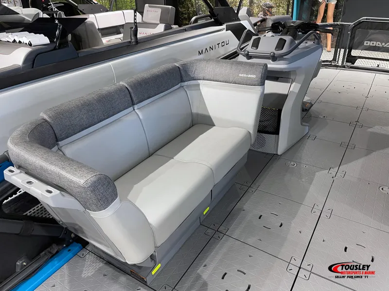 Slide: The Image of 2023 Sea-Doo Switch 19 interior with gray seating and modern helm controls. - 6