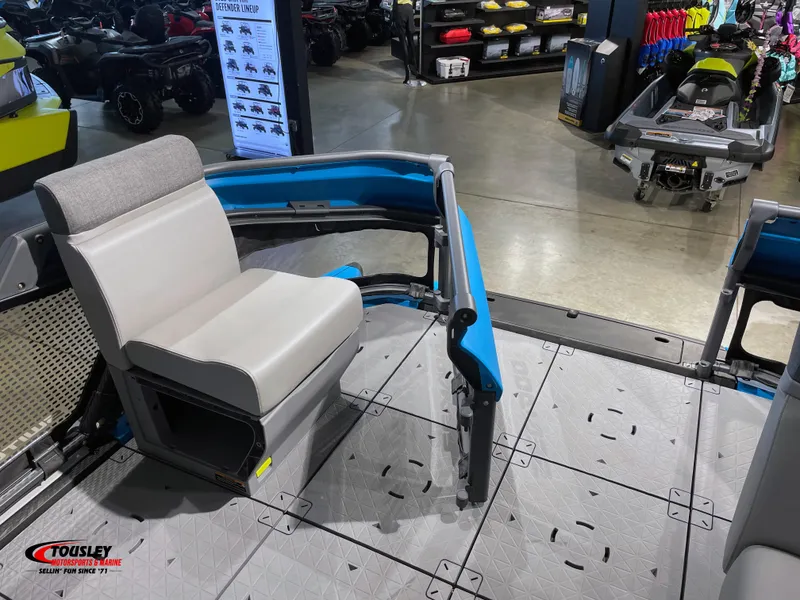 Slide: The Image of 2023 Sea-Doo Switch 19 interior with seating, displayed in a showroom. - 8