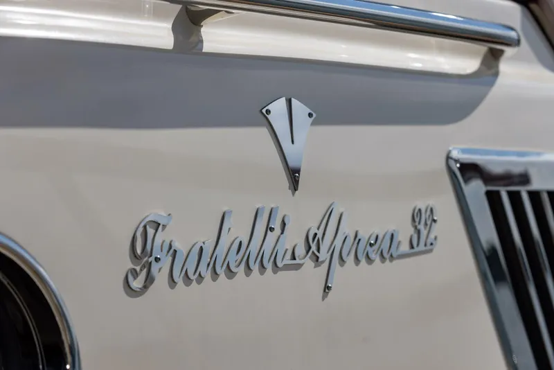 Slide: The Image of Fratelli Aprea 32 Hard Top 2022 logo on boat exterior. - 14