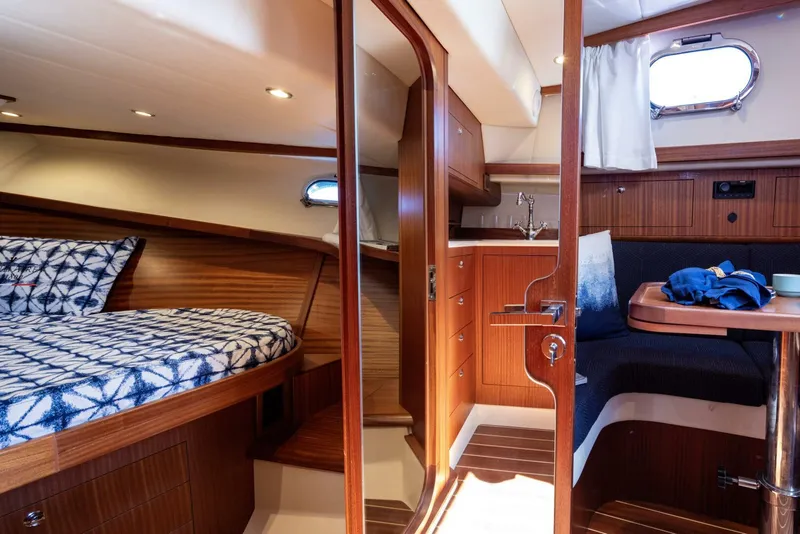 Slide: The Image of Luxurious interior of 2022 Fratelli Aprea 32 Hard Top yacht with cozy cabin and seating area. - 16