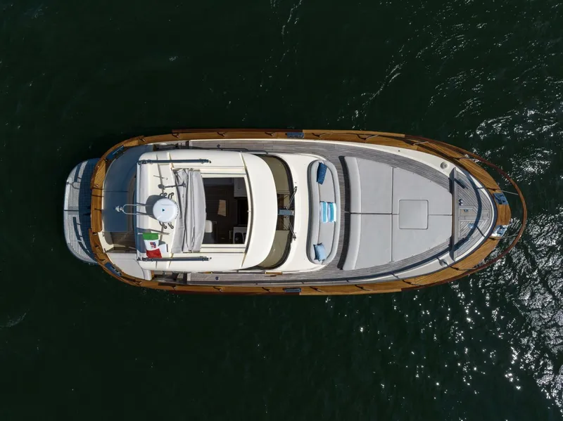 Slide: The Image of Overhead view of 2022 Fratelli Aprea 32 Hard Top yacht on water. - 2