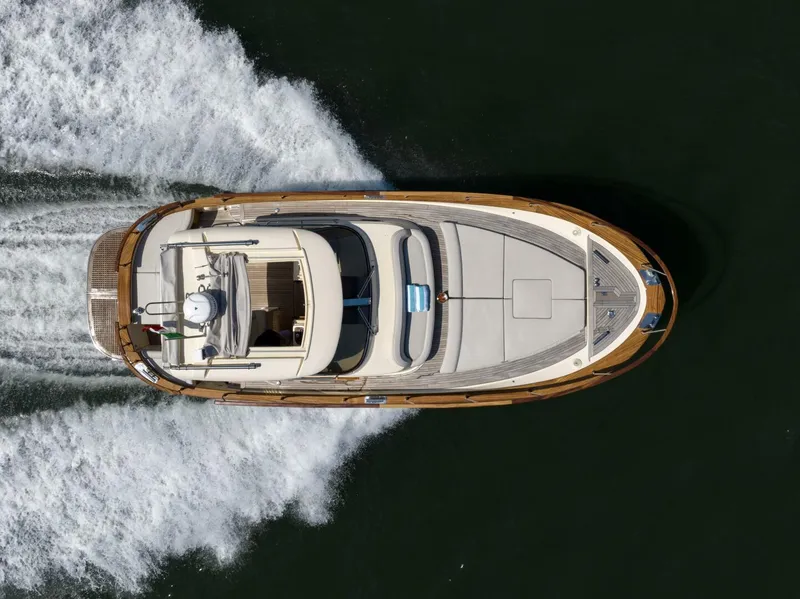 Slide: The Image of 2022 Fratelli Aprea 32 Hard Top yacht cruising on water, aerial view. - 3