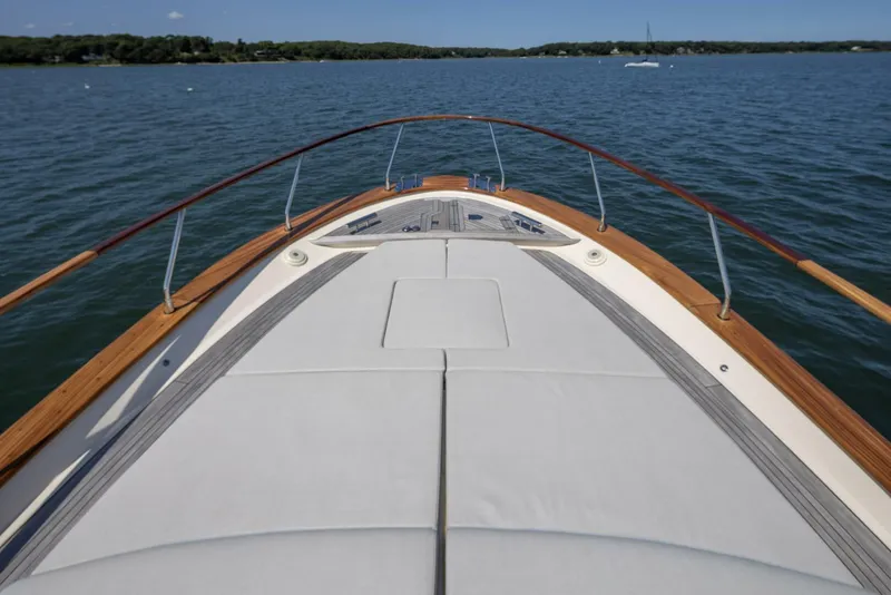 Slide: The Image of Fratelli Aprea 32 Hard Top 2022 yacht on calm waters, showcasing sleek deck design. - 8