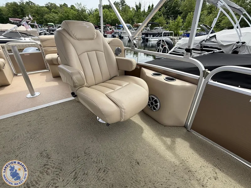 Slide: The Image of Luxurious seating on 2014 Bennington 2250 GSR pontoon boat at marina. - 8