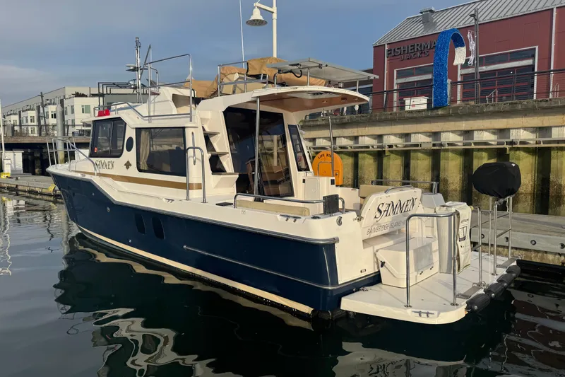 The Image of 2019 Ranger Tugs R-29 CB docked at a marina near Fisherman Jack's. - 0